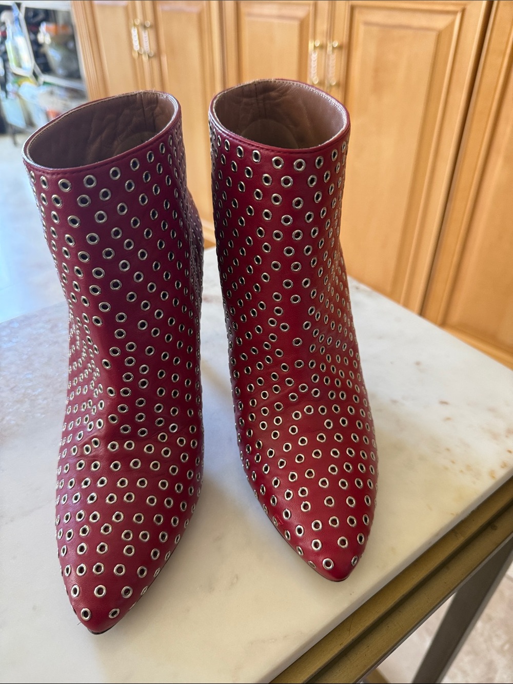 Alaïa Red Eyelet-Embellished Pointed-Toe Ankle Boots